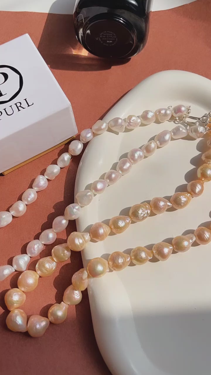 
                  
                    Load and play video in Gallery viewer, Timeless Natural Baroque Pearl Necklace| 925 Silver - From Purl
                  
                
